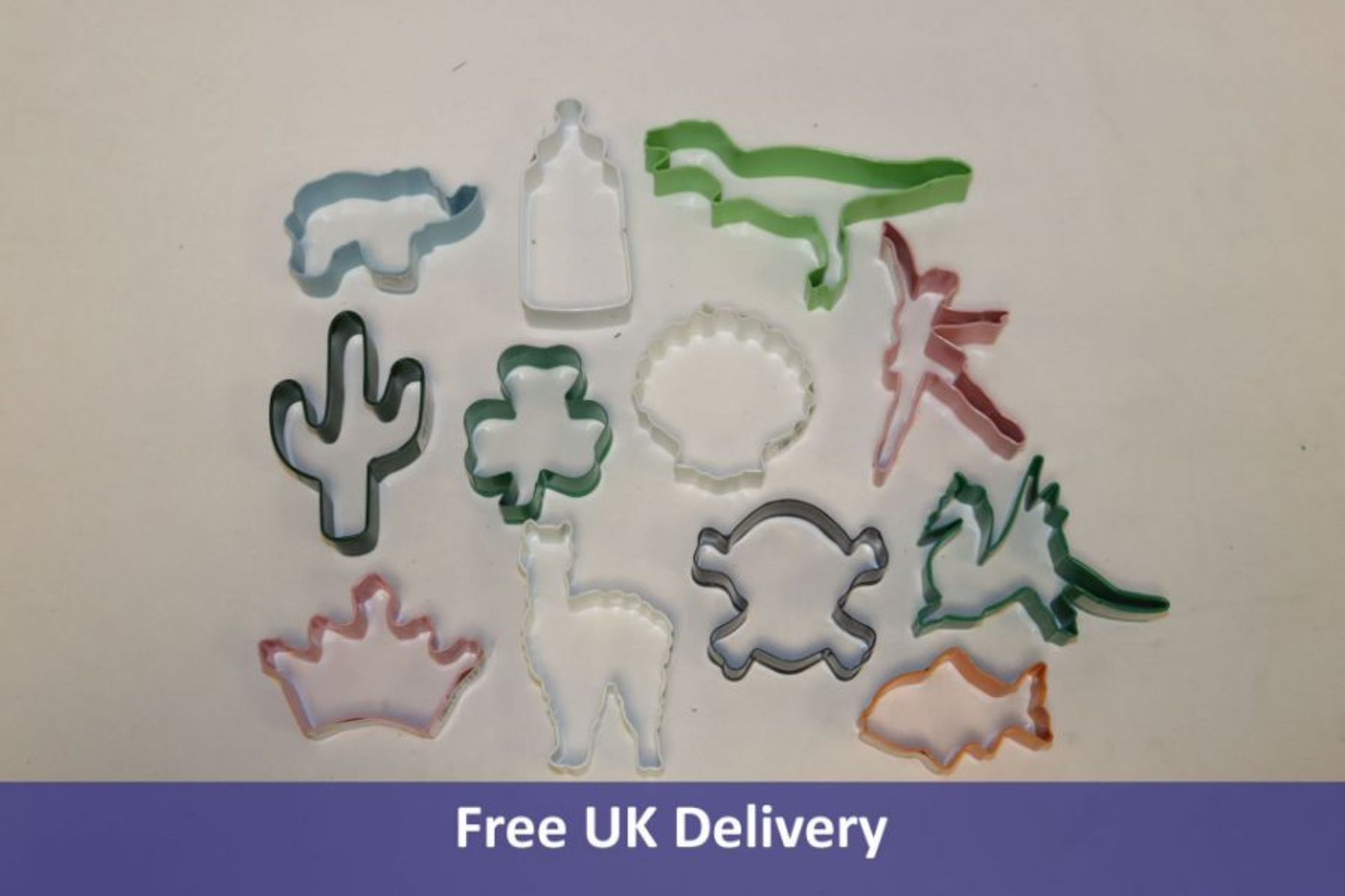 Fourteen Boxes of Assorted Cookie Cutters to include Airplanes, Fish, Llama, Sea Shells, Elephant, B