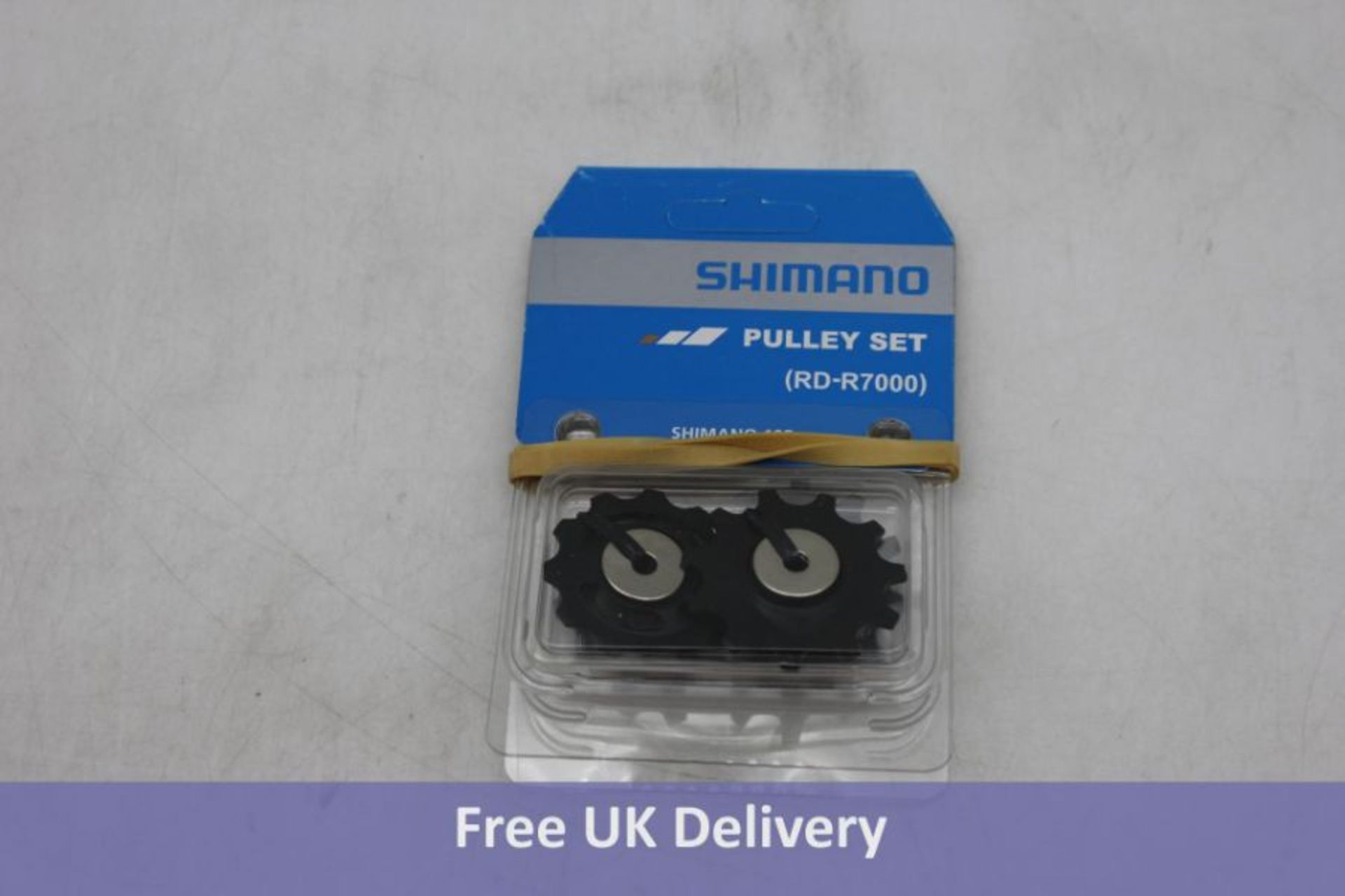 Two Shimano RD-R7000 Tension And Guide Pulley Sets
