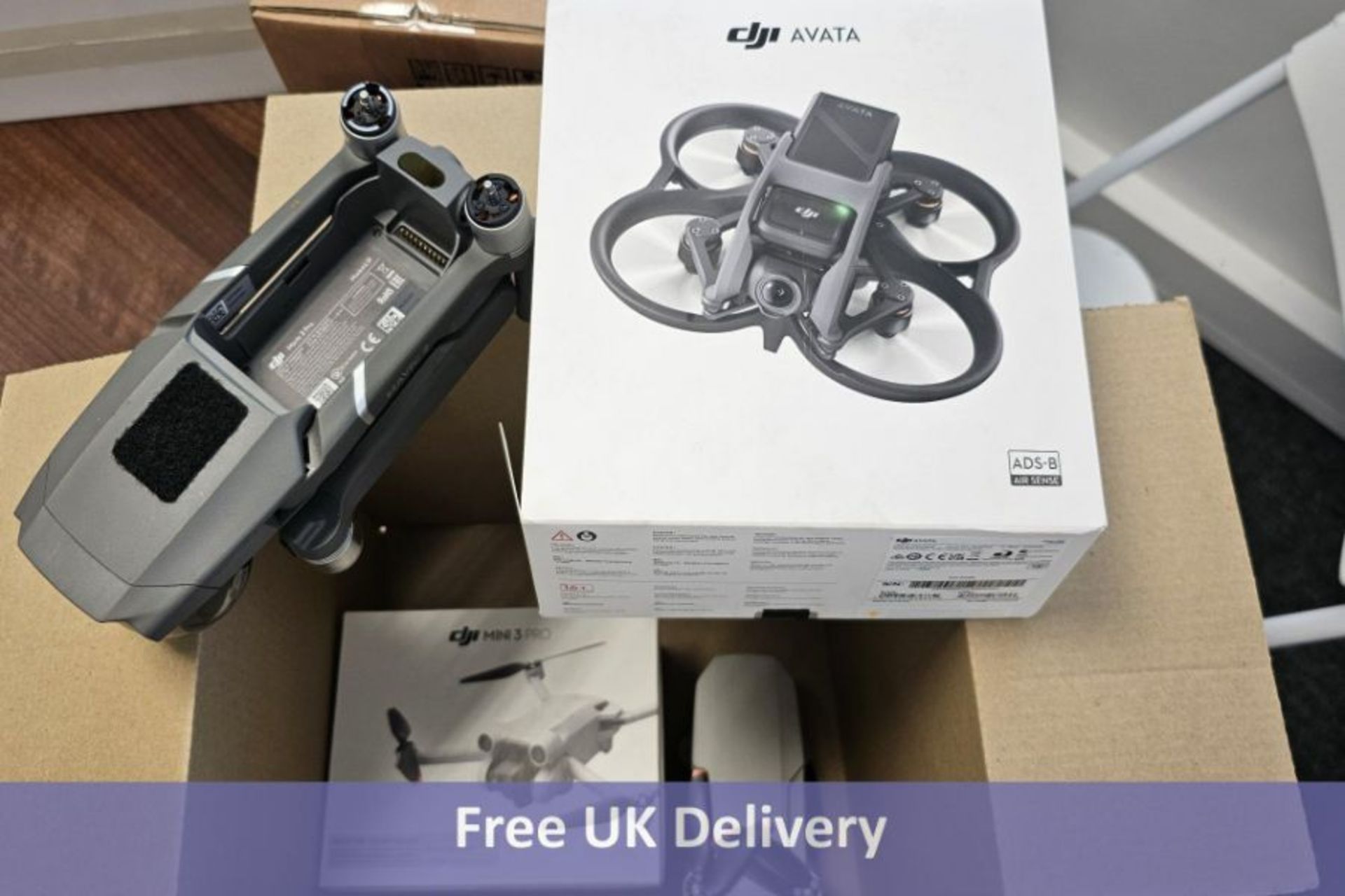 Four DJI Drones to include 1x DJI Mini 3 Pro, 1x DJI Avata, 1x DJI Mavic 2 Pro, No box, and 1x DJI M