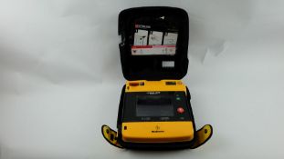 Lifepak 1000 Defibrillator, Case, Some minor Cracks on Facia, Used Untested No Battery or Leads.