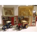 Two Britains tractors to include 9495- Ford 2120 and 9501-MF 3680 both are as new but have fading/