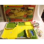 Britians 4713 farm play base in excellent condition, accessories in sealed bags, box has wear. P&P