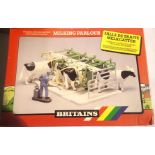 Three Britains 4710 milking parlour in excellent to near mint condition, in trade box, some