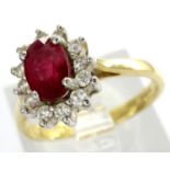 18ct gold ring set with a central ruby and diamond cluster, size J/K, 2.8g. P&P Group 1 (£14+VAT for
