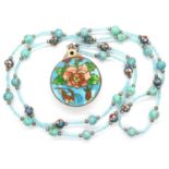 Enamelled cloisonné magnifying glass pendant on a beaded necklace, chain L: 92 cm. P&P Group 1 (£