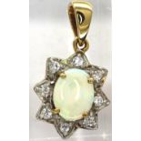 9ct gold flower pendant set with CZ stones and a central opal, L: 19 mm, 2.6g. P&P Group 1 (£14+