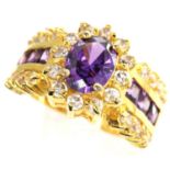 10ct gold flower ring set with amethyst and CZ stones, size P, 6.9g. P&P Group 1 (£14+VAT for the