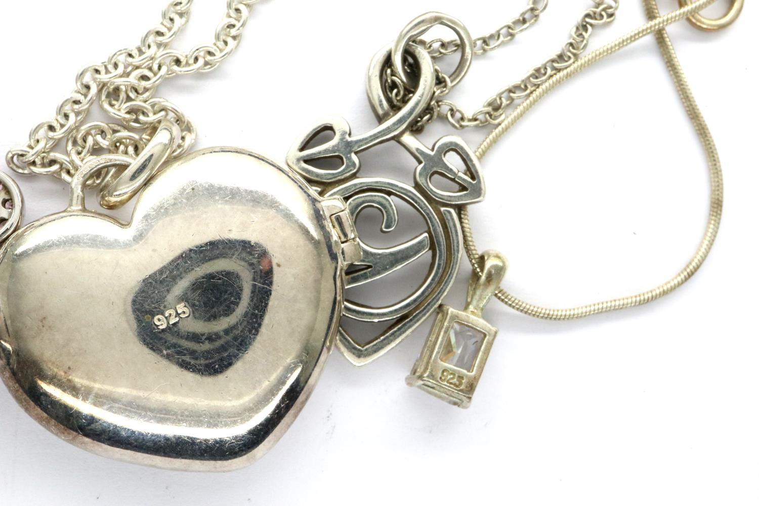 Four 925 silver pendant necklaces including a locket, largest chain L: 64 cm. P&P Group 1 (£14+VAT - Image 3 of 3