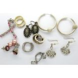 Ten pairs of 925 silver earrings including hoops. P&P Group 1 (£14+VAT for the first lot and £1+