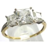 9ct gold trilogy ring set with CZ stones, size R, 1.9g. P&P Group 1 (£14+VAT for the first lot