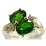 10ct gold dress ring set with six diamonds and two emeralds, size M, 2.6g. P&P Group 1 (£14+VAT