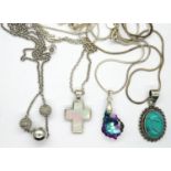 Four 925 silver pendant necklaces including a cross pendant, longest chain, L: 60 cm. P&P Group