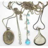 Four 925 silver necklaces including a pendant locket, largest chain L: 56 cm. P&P Group 1 (£14+VAT