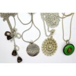 Four 925 silver pendant necklaces, longest chain L: 80 cm. P&P Group 1 (£14+VAT for the first lot