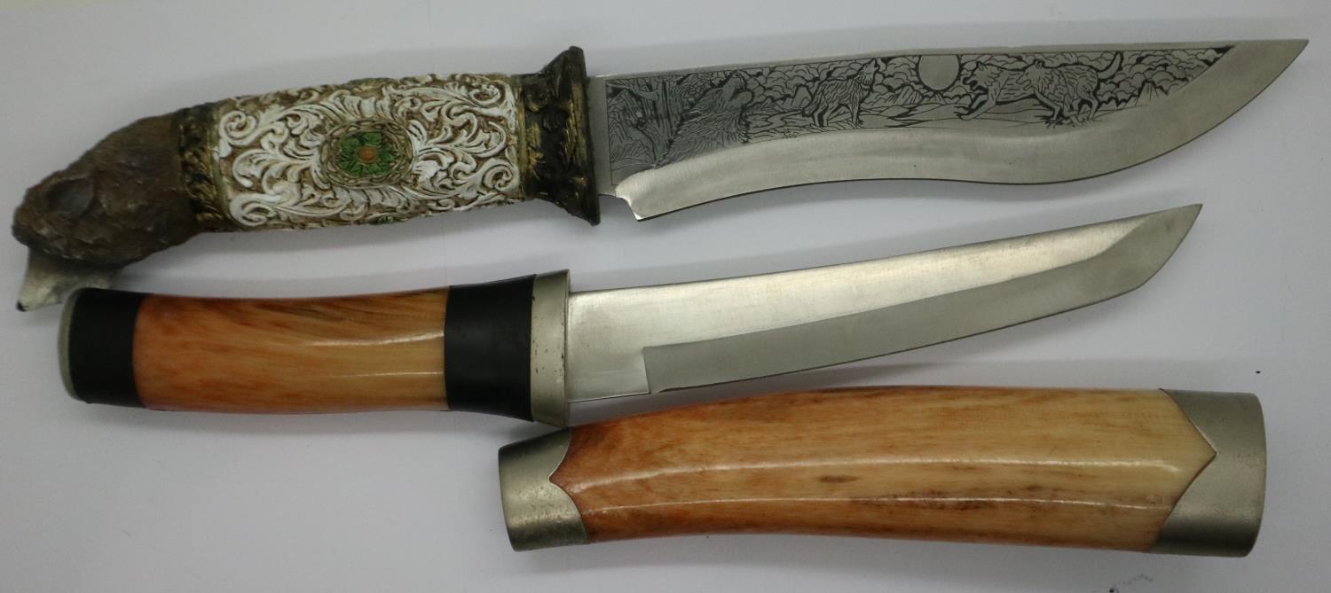 A modern Bowie style hunting knife with engraved blade and carved handle (lacking scabbard), - Image 2 of 3