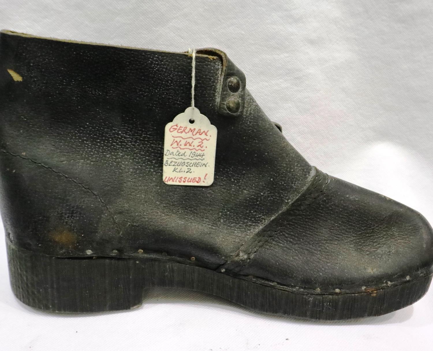 A pair of German WWII period ammo dump wooden heeled boots marked Bezug Schein KL.2, size 9/10 UK. - Image 2 of 2