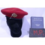British Military Police red beret size 57, embroidered armband and police law book (18th edition).