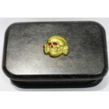 WWII German Waffen SS Deaths Head skull badge, mounted onto a wooden box. P&P Group 2 (£18+VAT for