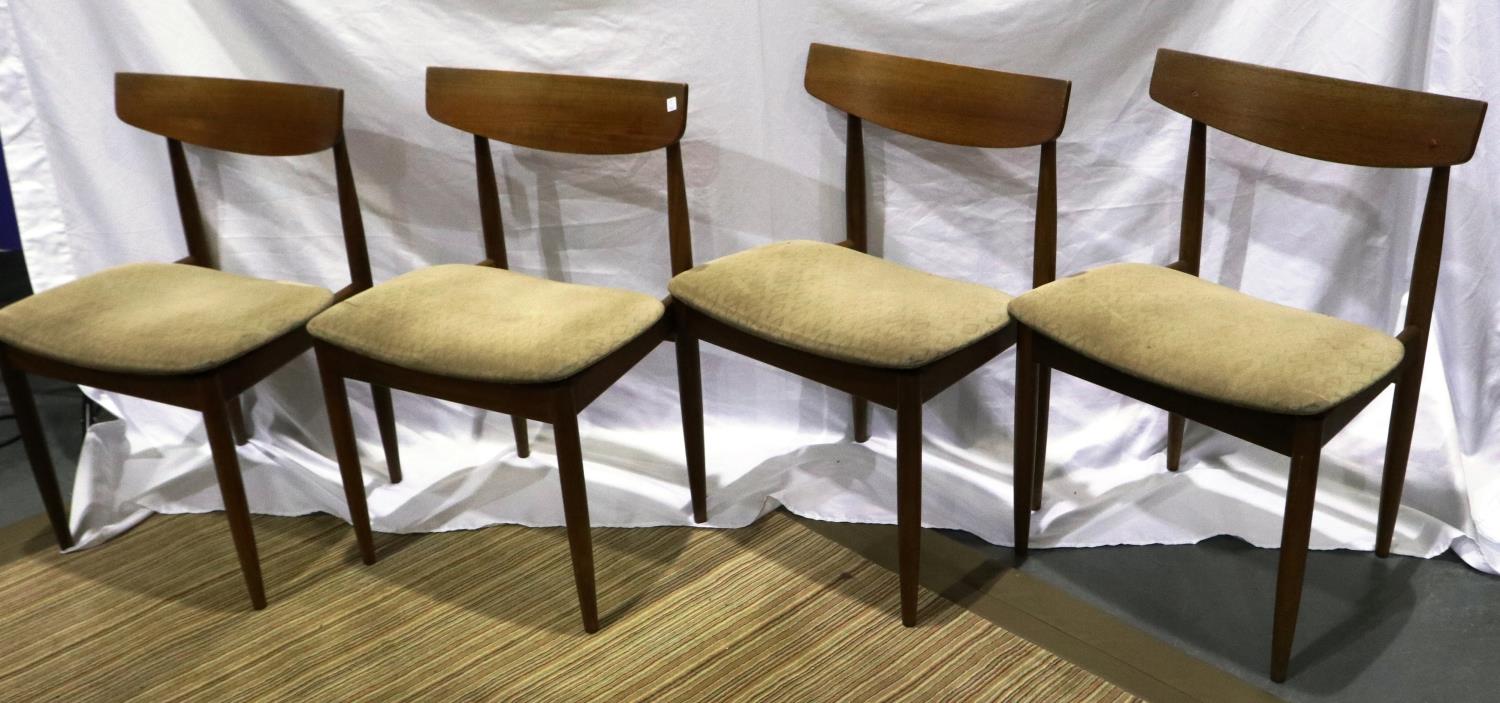 G Plan, set of four mid 20th century dining chairs with upholstered seats. Some marks to seats,