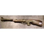 Wall hanging blunderbuss with brass details and eagle form handle. Not available for in-house P&P