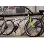 Challenge Beacon folding bike with 16 Tourney gears and 14 inch frame. Not available for in-house