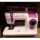 Toyota ECO 34A sewing machine, all cables present, working at lotting. Not available for in-house