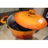 Le Creuset Orange cast iron two handed casserole pot, D: 25 cm. Not available for in-house P&P