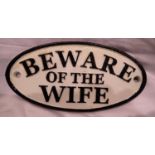 Cast iron Beware of the Wife plaque, W: 12 cm. P&P Group 1 (£14+VAT for the first lot and £1+VAT for