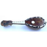 Miniature faux tortoiseshell mandolin, H: 13 cm. P&P Group 1 (£14+VAT for the first lot and £1+VAT