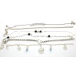 Six 925 silver bracelets including a charm bracelet, longest chain L: 24 cm. P&P Group 1 (£14+VAT