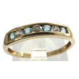 9ct gold ring set with channel set CZ and blue topaz, size P, 1.6g. P&P Group 1 (£14+VAT for the