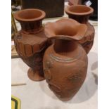 Pair of terracotta Chinese dragon vases and another, H: 31 cm. No chips or cracks. Not available for