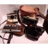 Three cameras to include Kodak, Polaroid land camera and Yashica Zoomtec 105. P&P Group 2 (£18+VAT