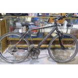 Muddy Fox Tempo 19 inch frame, 21 speed road bike with front suspension, equipped with Shimano