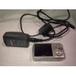 Olympus Hyper crystal LCD digital camera and a Olympus LI-ion battery charger. P&P Group 2 (£18+