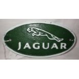 Small cast iron Jaguar plaque, W: 14 cm. P&P Group 1 (£14+VAT for the first lot and £1+VAT for