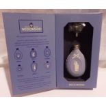 Boxed Wedgwood Jasperware powder blue perfume bottle. P&P Group 1 (£14+VAT for the first lot and £