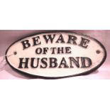 Cast iron Beware of the Husband sign, W: 12 cm. P&P Group 1 (£14+VAT for the first lot and £1+VAT