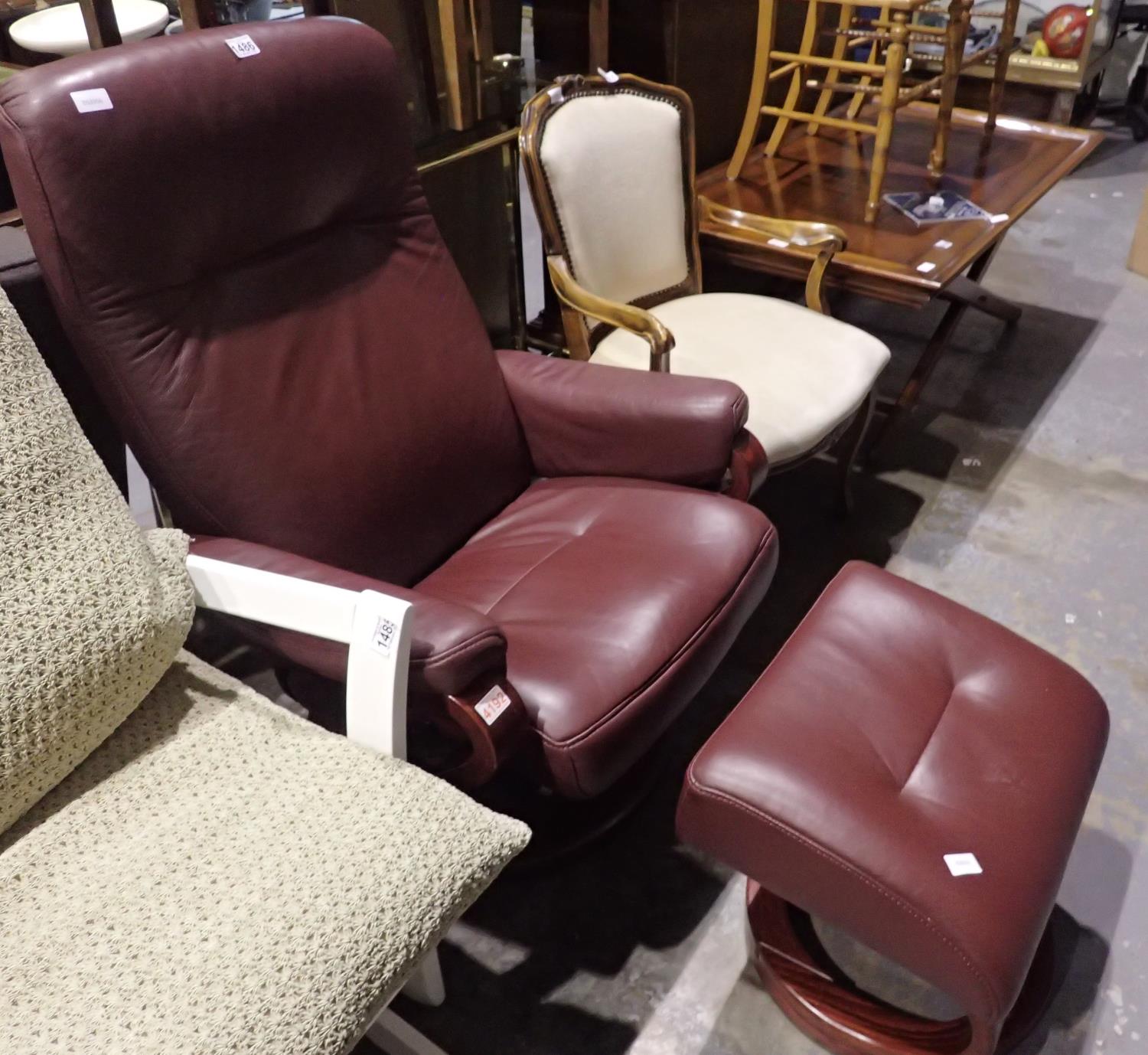 Burgundy leather reclining chair with matching footstool. Not available for in-house P&P