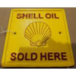 Cast iron Shell Sold Here plaque, W: 15 cm. P&P Group 1 (£14+VAT for the first lot and £1+VAT for