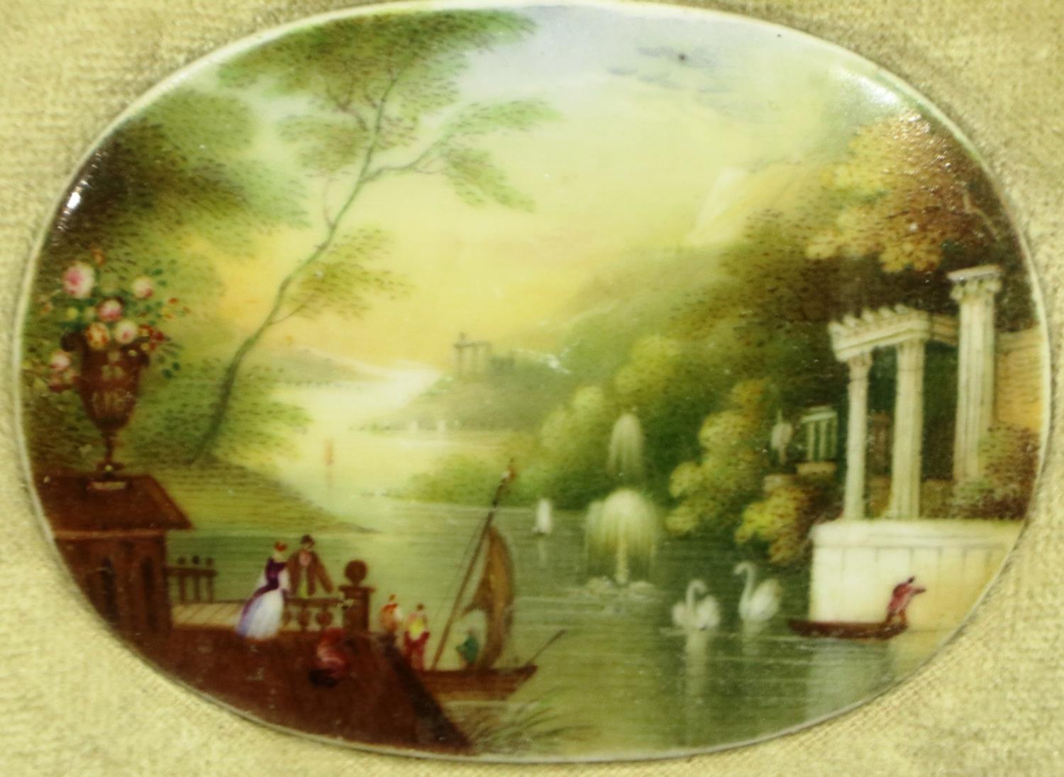 A 19th century miniature ceramic plaque, painted with a scene of Romanesque columns beside a