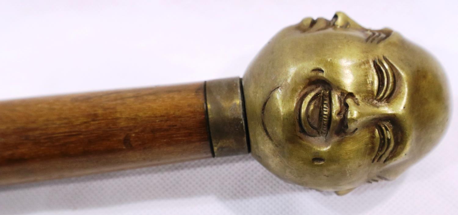 Brass four faced Buddha handled walking stick, L: 94 cm. P&P Group 3 (£25+VAT for the first lot - Image 4 of 5