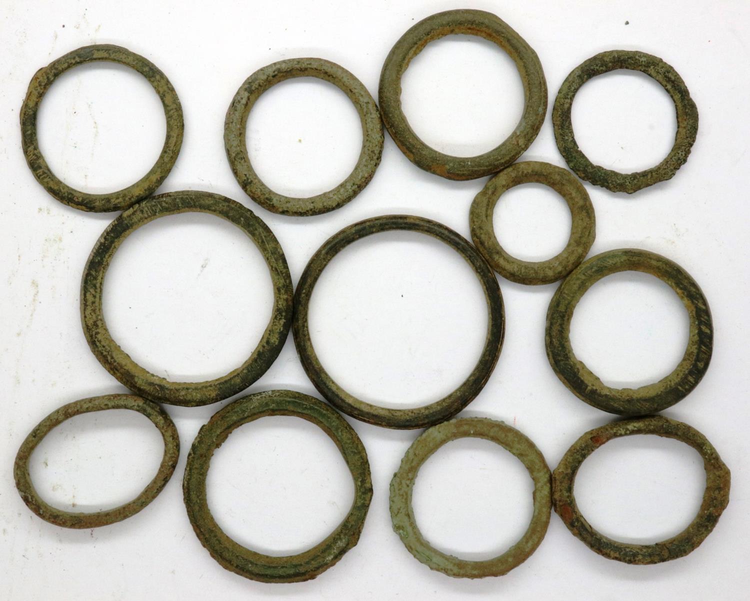 Bronze Age Celtic proto ring money, largest D: 32 mm. P&P Group 0 (£5+VAT for the first lot and £1+
