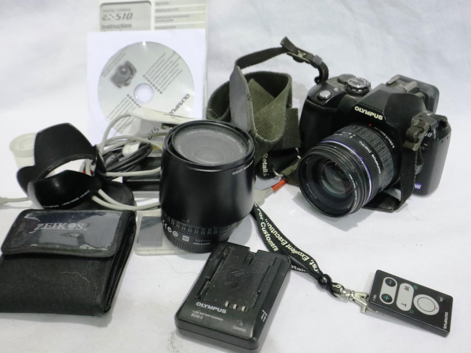 Olympus E510 digital camera with accessories and an Olympus digital, 40-150mm, 1:4-5.6 ED lens.