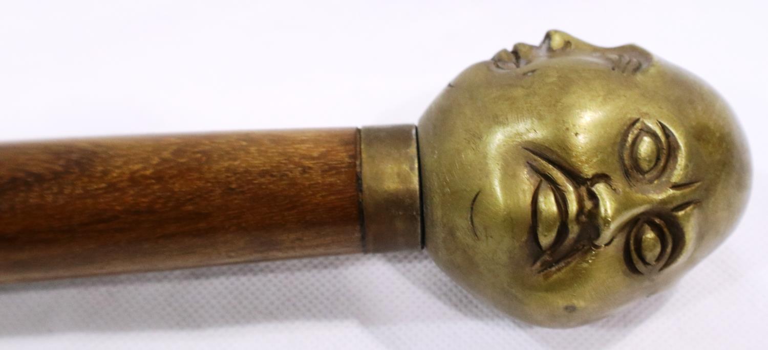 Brass four faced Buddha handled walking stick, L: 94 cm. P&P Group 3 (£25+VAT for the first lot - Image 2 of 5