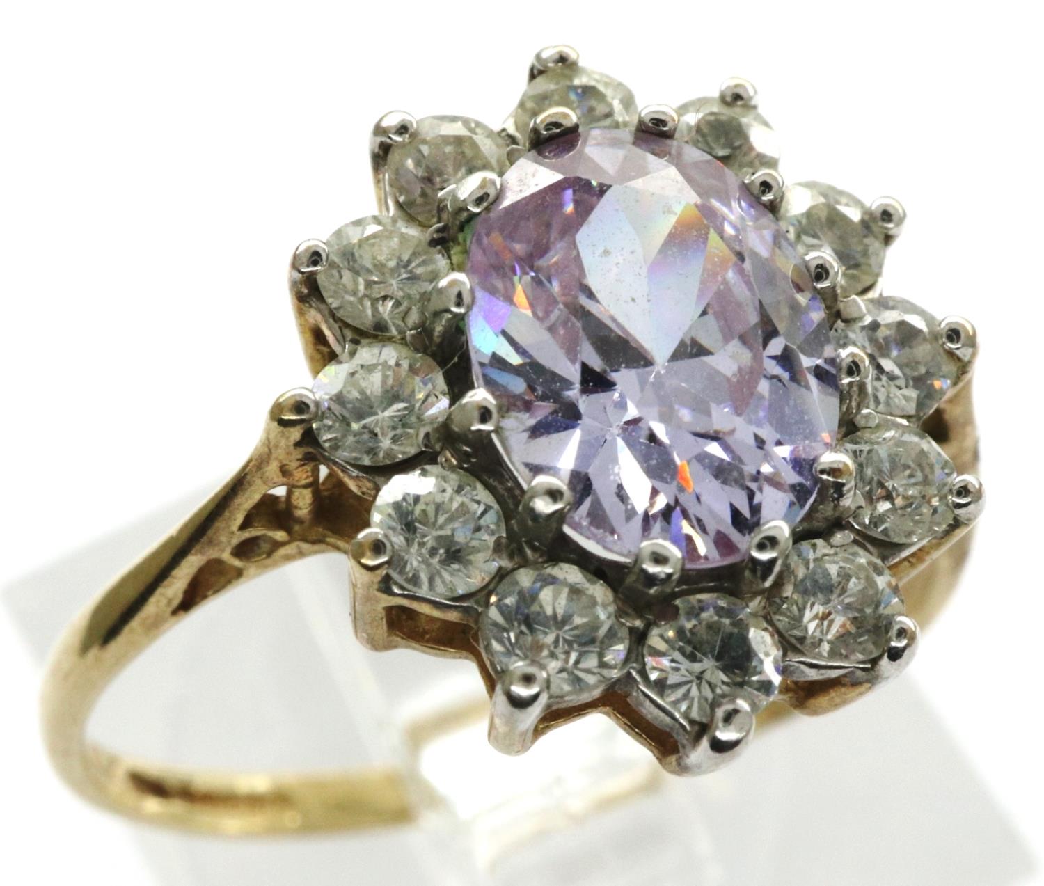 9ct gold daisy ring set with amethyst and CZ, size P, 2.2g. P&P Group 1 (£14+VAT for the first lot