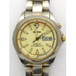 SEIKO: Kinetic 50M gents automatic wristwatch, with circular yellow dial, French day and date
