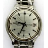 SEIKO: DX SEALION M110 gents steel cased automatic wristwatch, with circular silvered dial, day