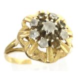 Continental presumed 9ct gold flower ring, set with a cluster of clear stones, size P, 3.2g, lacking