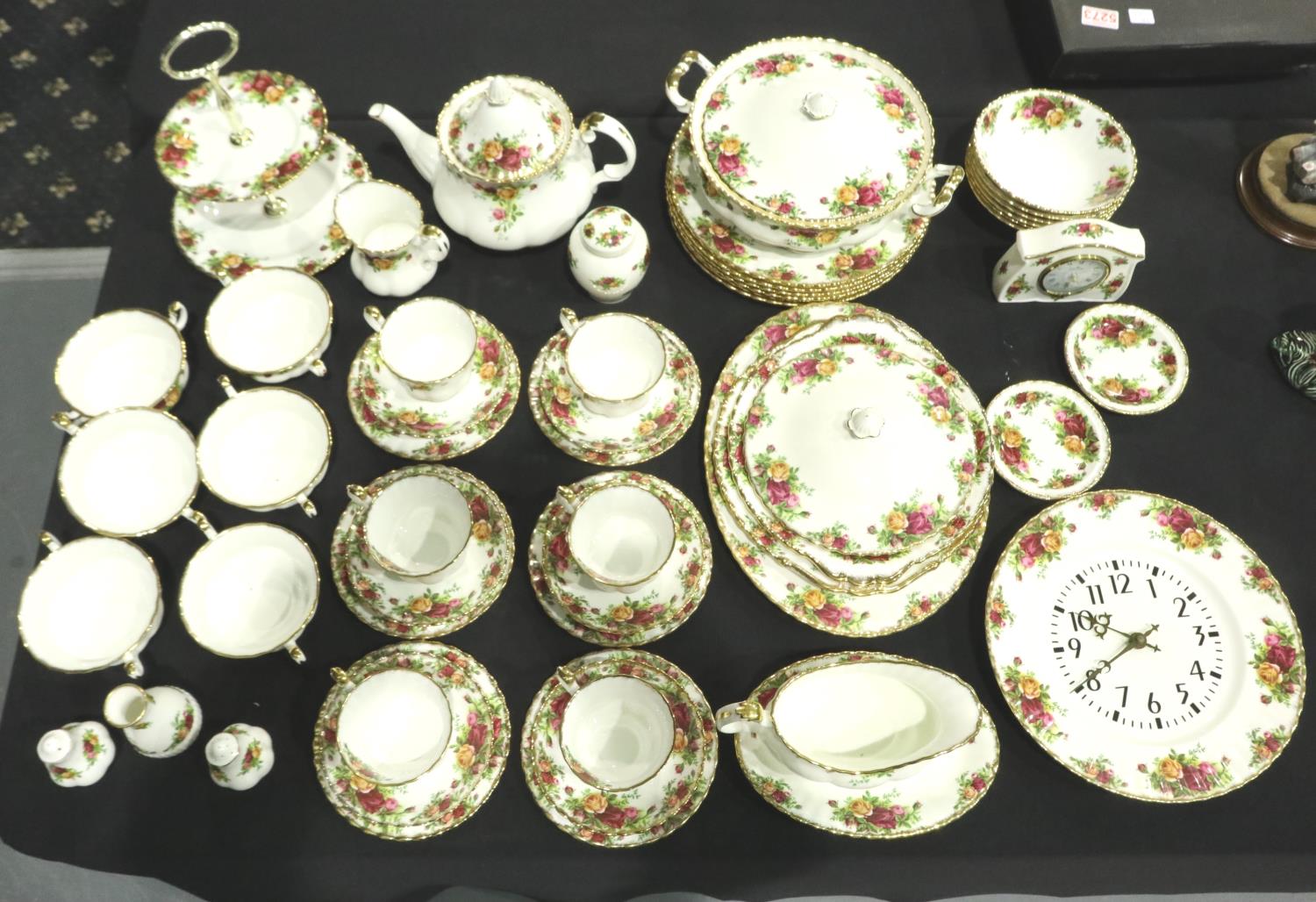 Fifty five pieces of Royal Albert Old Country Roses including a dinner service and two clocks, no